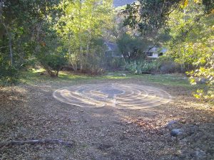 in ground stone Labyrinth surrounded by forest