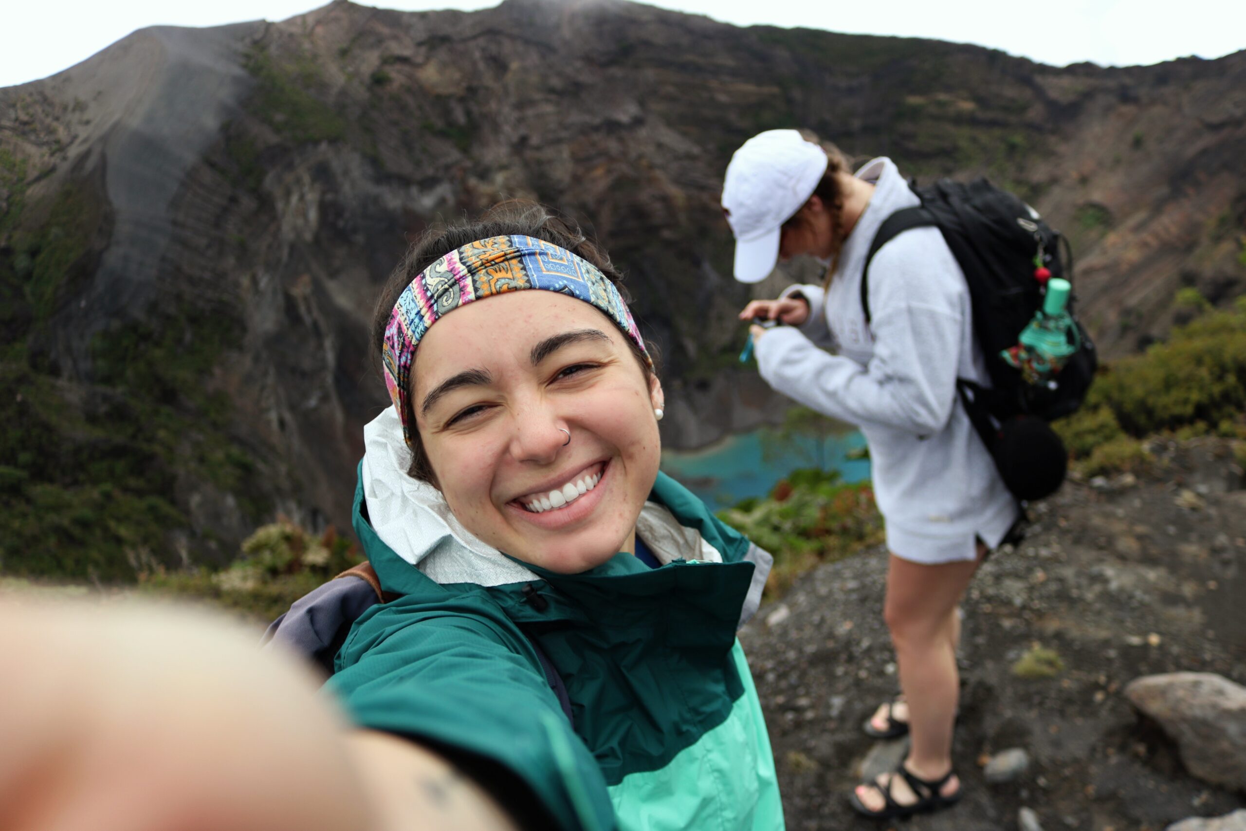 Student takes selfie in the mountains during summer study abroad trip.