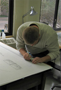 Ben working on drawings