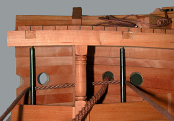 Interior of bow showing messenger run around rollers and cable entering through hawse hole. Normally, there were four hawse holes