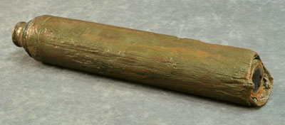 spyglass with a wooden sheath surrounding the eye piece
