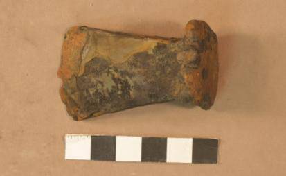 Iron wedge may have been used with the wedge during the original salvage efforts by the Shark's crew.