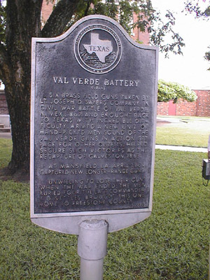 A Texas Historical Marker, giving details on the history of the cannon.