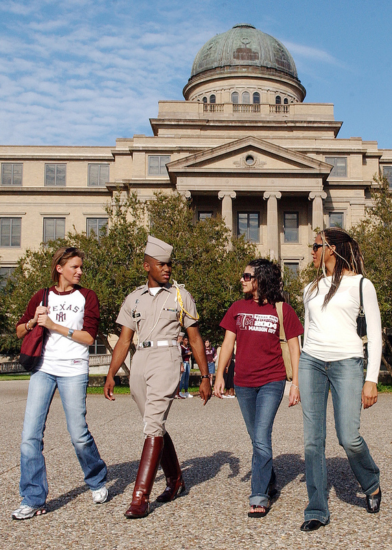 Diverse students walking together on campus