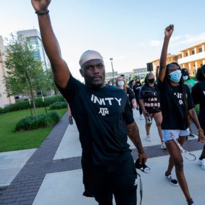 students peacefully demonstrate in unity