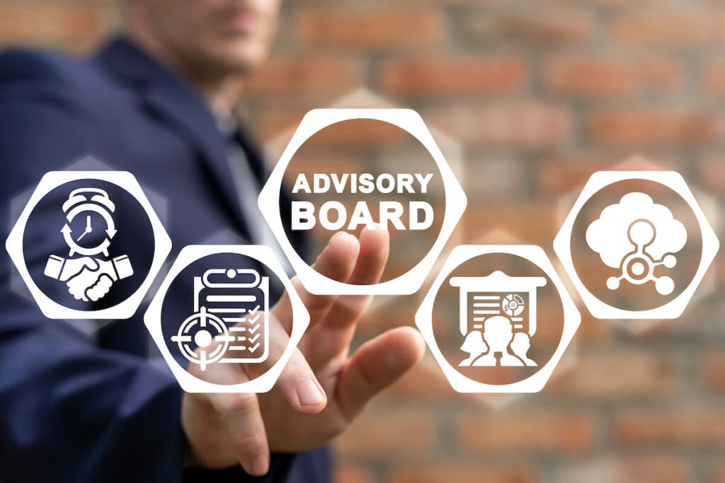 five hexagon with different work symbol including title advisory board with blur background of a brick wall and a person pointing advisory board symbol