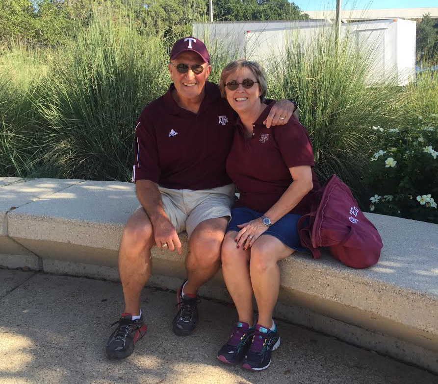 Mike and Debbie Hilliard pose in Aggie gear