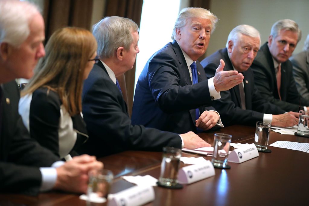 U.S. President Donald Trump (C) presides over a meeting about immigration with Republican and Democrat members of Congress, including (L-R) Senate Majority Whip John Cornyn (R-TX), Rep. Martha McSally (R-AZ), Senate Minority Whip Richard Durbin (D-IL), House Minority Whip Steny Hoyer (D-MD) and House Majority Leader Kevin McCarthy (R-CA) in the Cabinet Room at the White House January 9, 2018 in Washington, DC. (Chip Somodevilla/Getty Images)