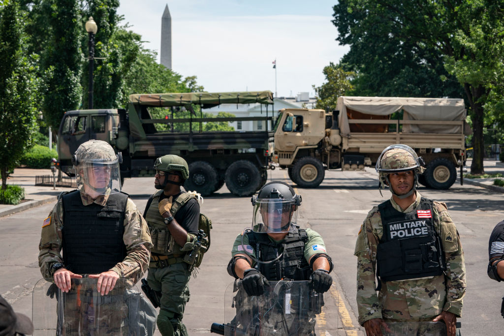 Police forces and National Guard vehicles are used to block 16th Street near Lafayette Park and the White House on June 3, 2020 in Washington, DC. Protests in cities throughout the country continue in the wake of the death of George Floyd, a black man who died while in police custody in Minneapolis on May 25..