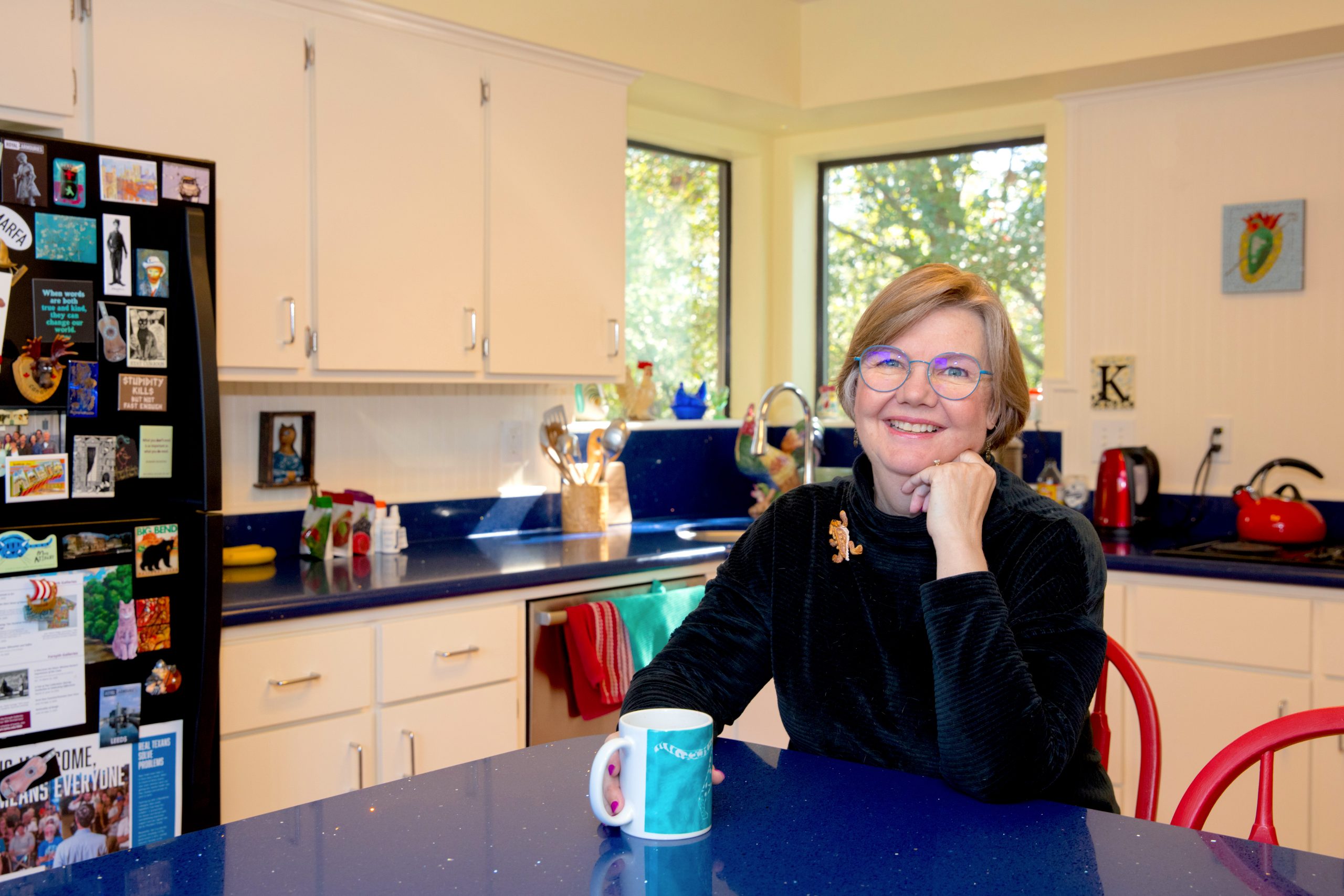 Kathi Appelt in the heart of her home, her kitchen.