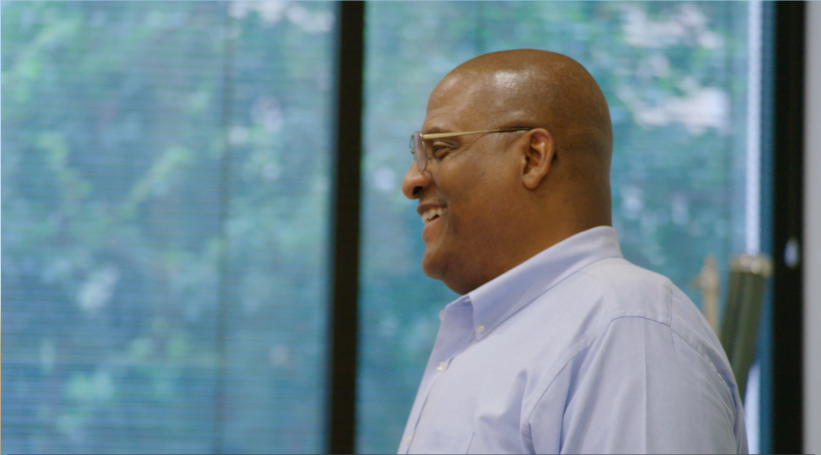 Dr. Leroy Dorsey smiling at his class.