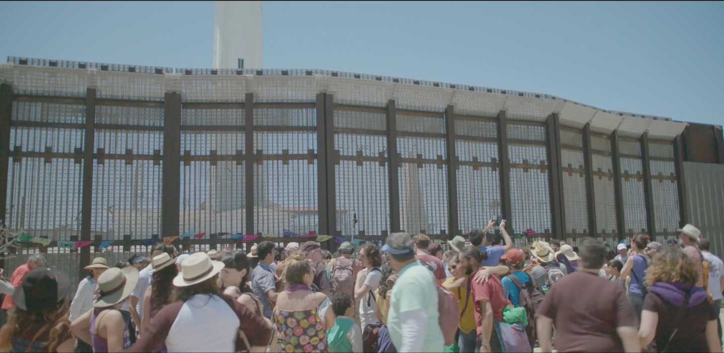 Large crowds gather on either side of the border fence for the Fandango Fronterizo.