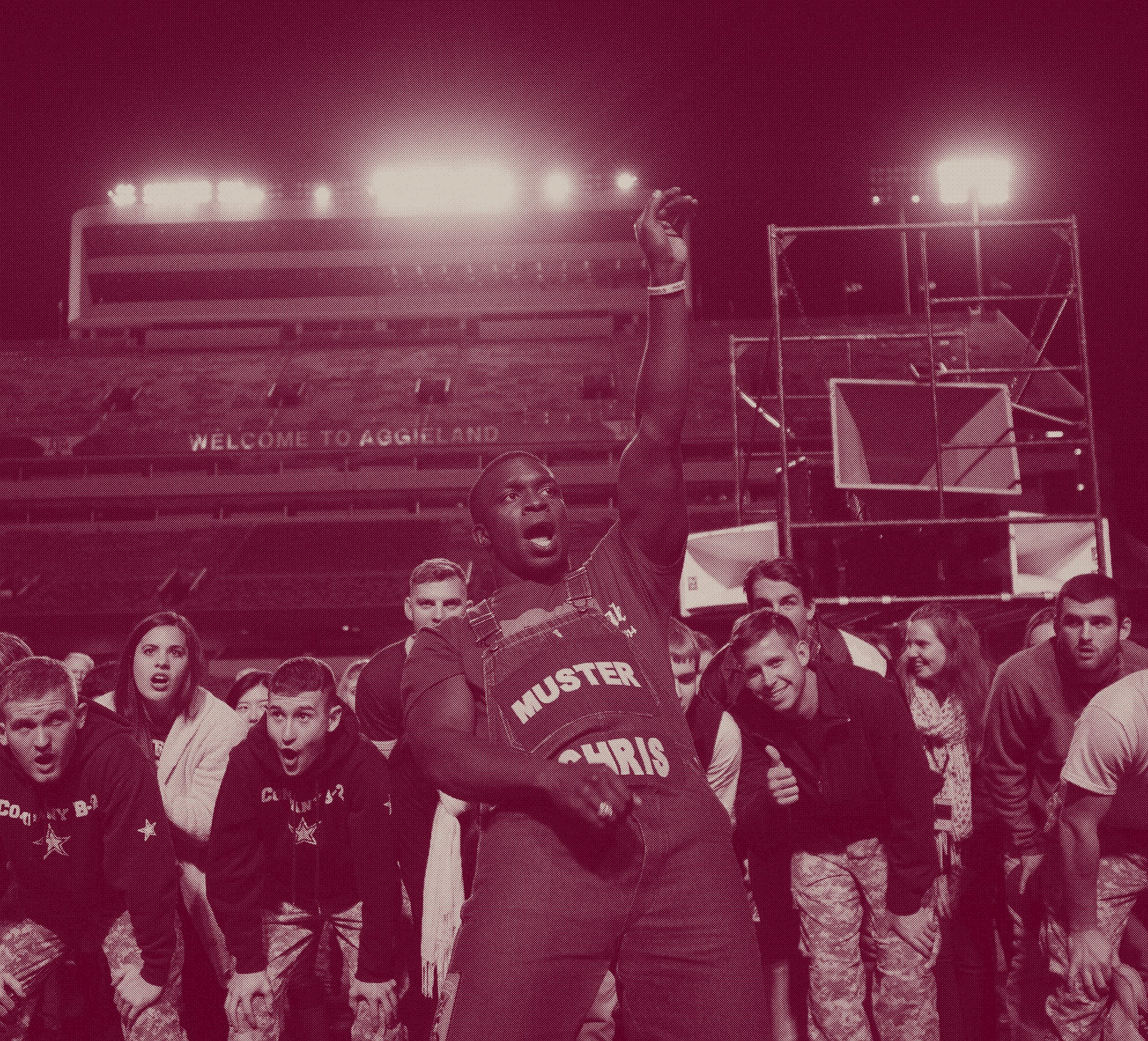Powell leads a yell at Midnight Yell Practice. 