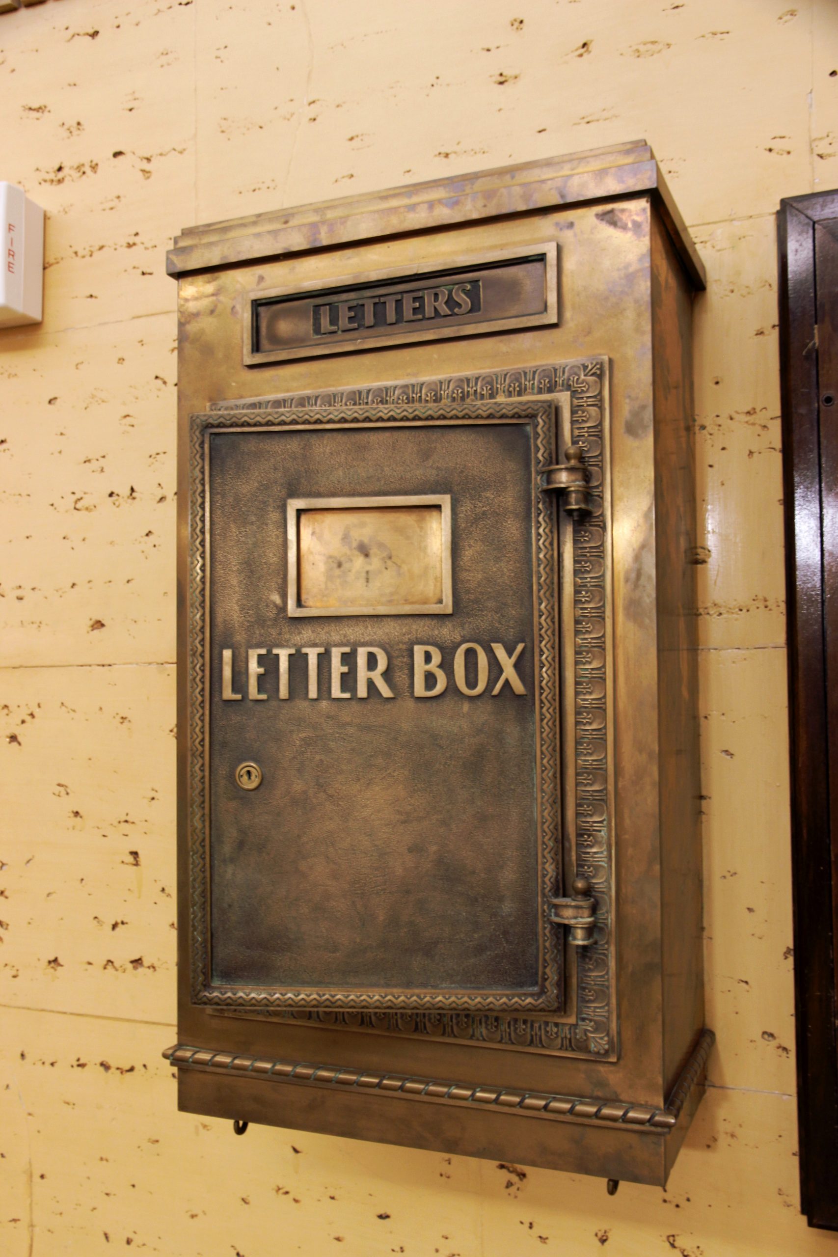 A golden letter box fit for administrators is left open.