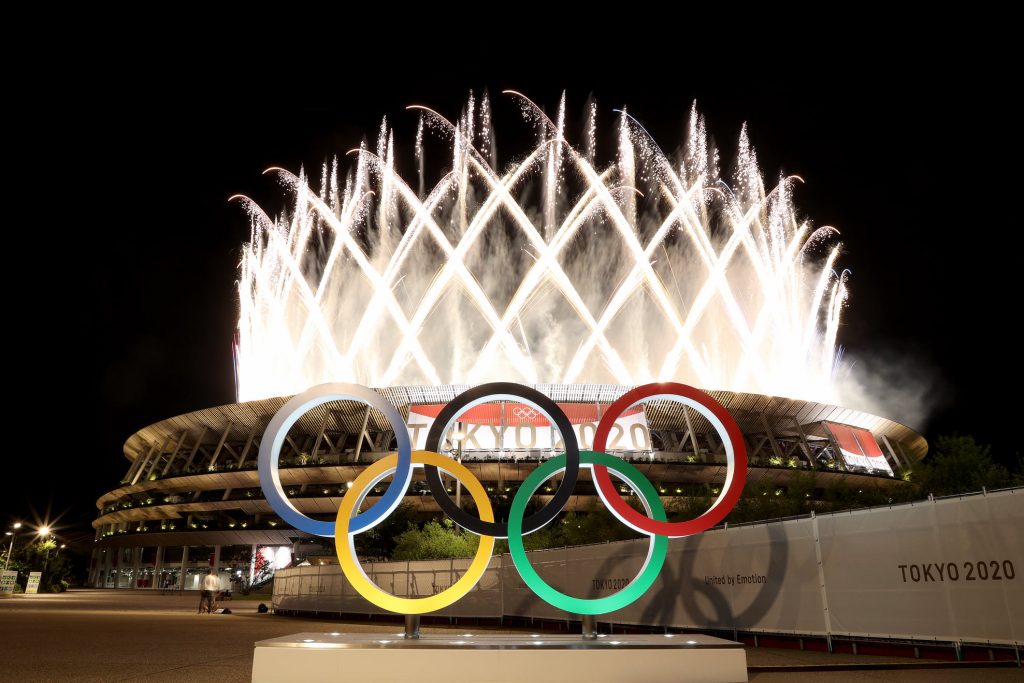 The Olympic rings contrast nicely with against the night sky.