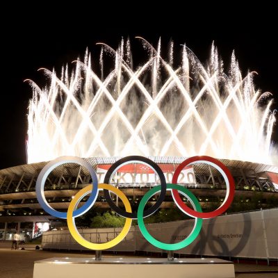 The Olympic rings contrast nicely with against the night sky.