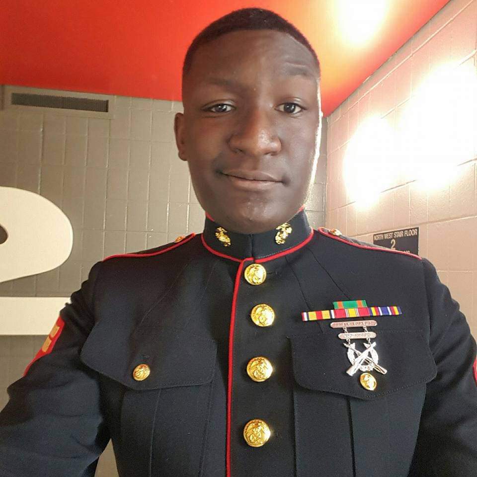 Marquis takes a selfie in his Marine uniform.