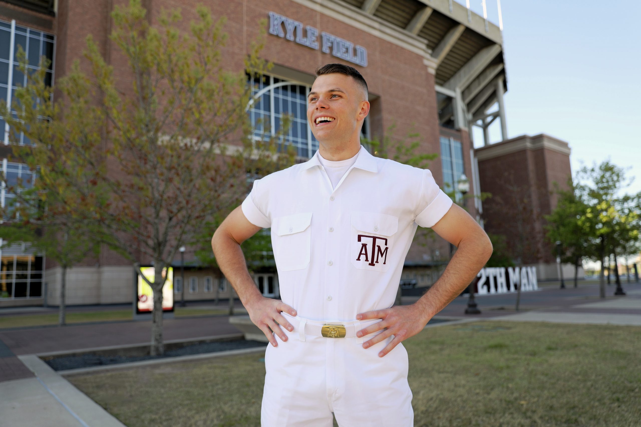 Thomas Greve ‘24 poses for a photo in front of Kyle Field.
