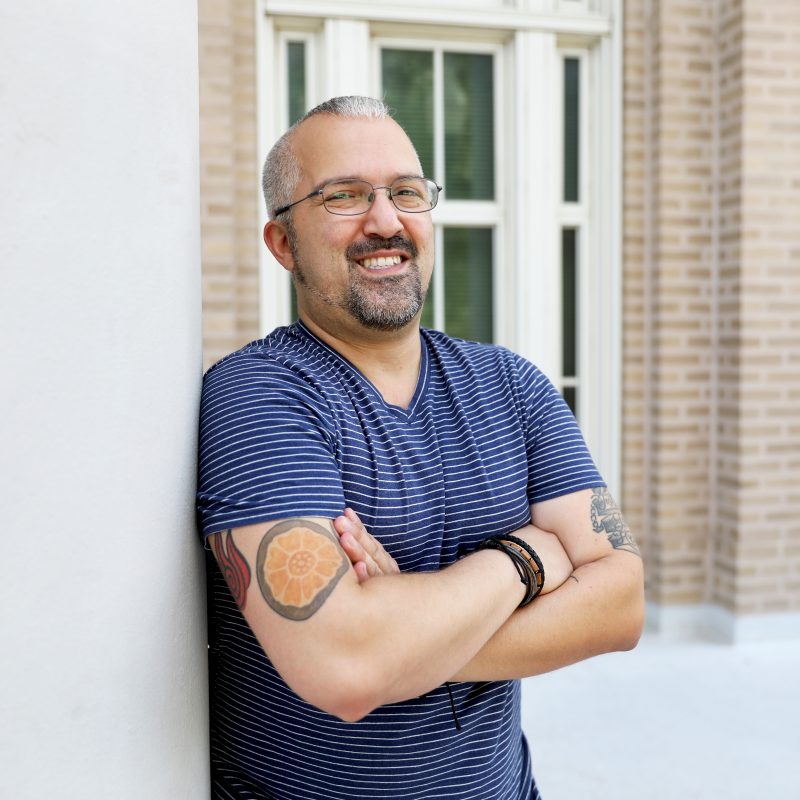 Manuel Grajales pauses for a photo on campus.
